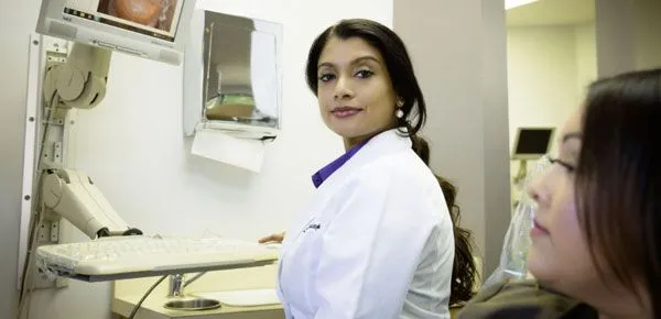 Dr. Lakshmy Sudeep providing preventive dental care to a patient